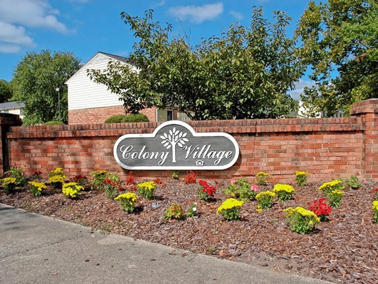 Welcome sign for Colony Village