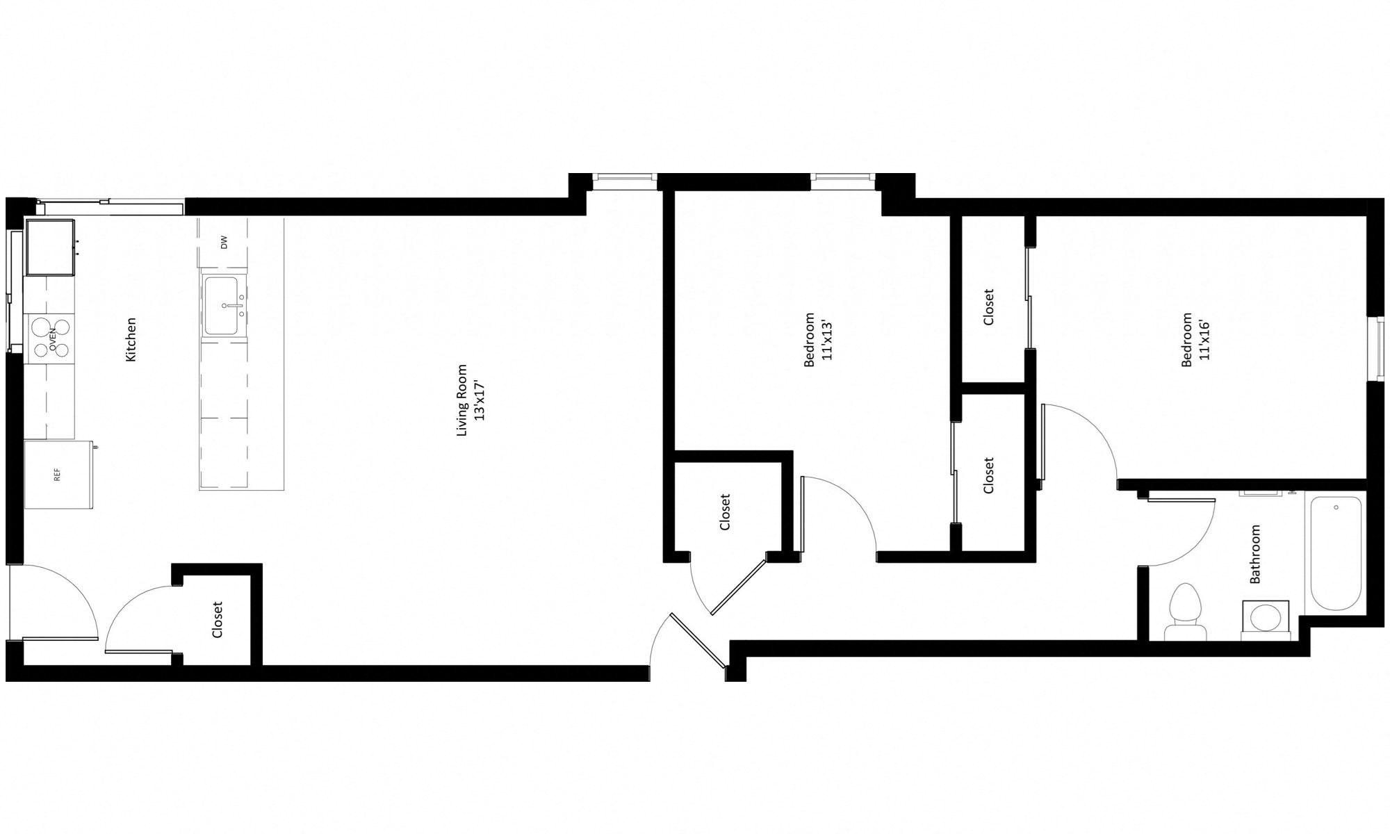 Open kitchen and living space with beds and bath to one side.
