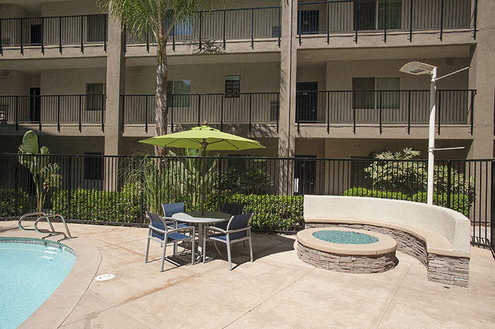Pool with lounge chairs  l Davinci Apartments